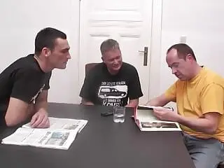 Dark haired German lady gets banged by three loaded cocks