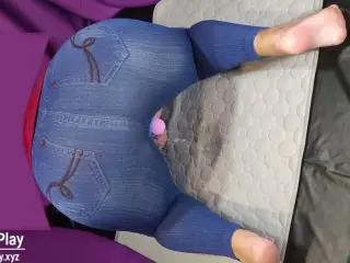 Big ass in jeans pissing with vibrator