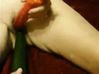 Mature slut sue using veg as sex toys