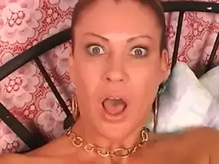 Sexy whore with brown hair gets a load on her face after she gets fucked