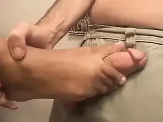 Guy sniffs her black feet and rubs them on himself