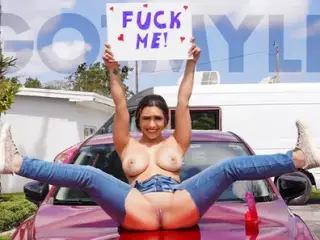 Gorgeous Exhibitionist Lilly Hall Sits On The Hood Of Her Car With A Big Sign That Says - Fuck Me