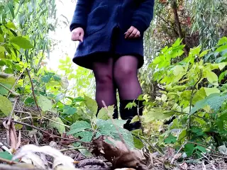 Russian milf in boots and sexy stockings pissing outdoors