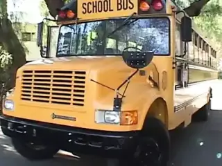 Blond chick gets banged from behind on her school bus