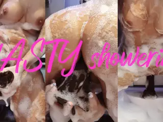 Busty MILF caught showering and masturbating with a huge dildo