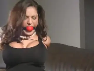 Busty girl zip-tied and gagged