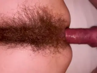 Slim super hairy MILF does anal and squirts a lot