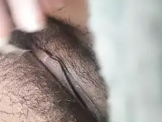 Hairy teen squirting a lot of water