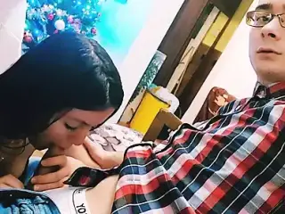 Hot babe is sucking boyfriend's dick while he's playing video games