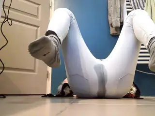 Emma pissing on all fours in her tight white pants