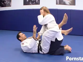 Megan Fenox does karate and with handsome coach