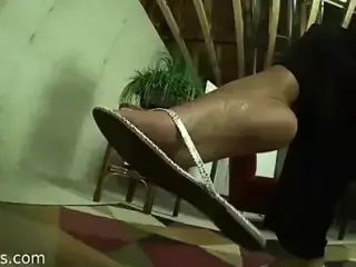 Feet in flip flops