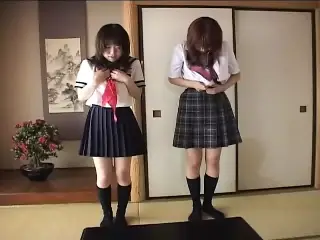 Two naughty school girls having fun