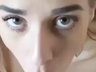 Gorgeous green eyed brunette sucking cock (who is she?)