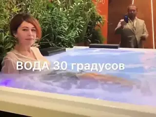 Russian Babe Gets Soaked in Clothes in Public Hot Tub