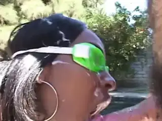 Ebony with saggy tits gets cock by the pool