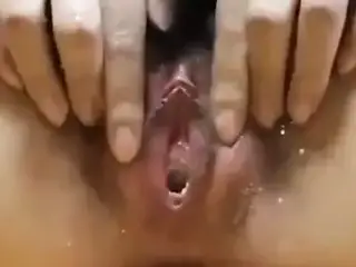 Young amateur masturbating her hairy pussy