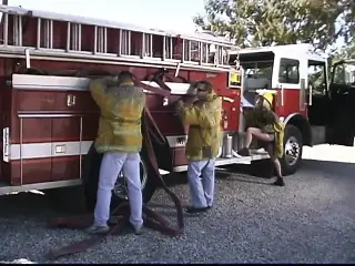 Starving blonde whore is serving the whole fire team right on the fire-truck