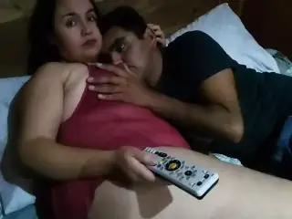 Stepmom and stepson are watching a movie but my stepson's big dick gets hard