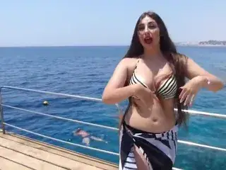 Hot bikini girl dance on beach