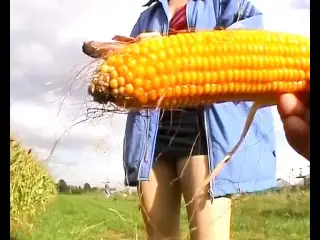 Stunning German lady stuffing a corn in her moist holes