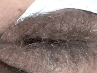 While I rest at the hotel on the beach, my boss films my big hairy pussy