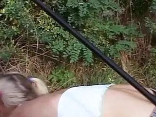 Beautiful blonde girl taking a hard cock in the middle of the woods