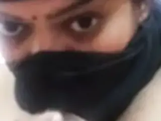 Tamil aunty stripping nude and fingering herself.