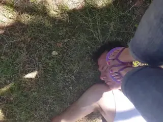 Face standing by flipflops