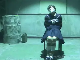 Japanese Schoolgirl tied and gagged in warehouse