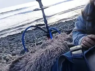 The girl sucked right on the beach near the sea!