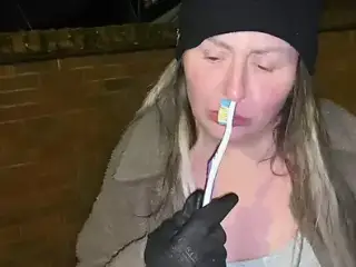 Street girl fucks Herself with a toothbrush!