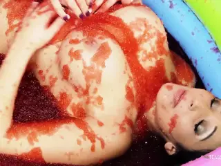 Kissing turns into food wrestling between the two brunette