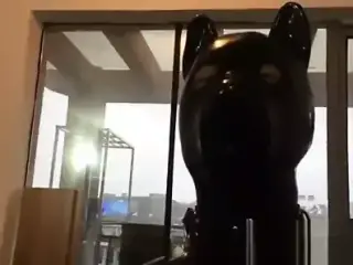 rubber pup bondage