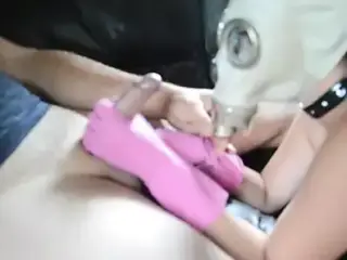 Gasmaked Girl Gives Rubber Glove Handjob