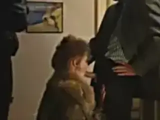 Bondage blowjob in fur coat