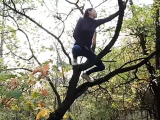 Girl masturbates on a tall tree in a public place - Lesbian-illusion