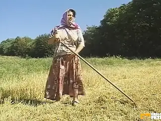 Two Farmers and One Horny Babe Bang Their Fuck Holes on the Field