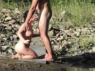 I get fucked in the throat on the bank of a mountain river in a public place